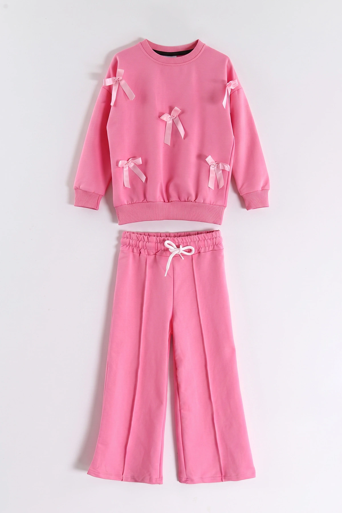 Pembe (3-10 Yaş)Fiyonk Aksesuarlı Çimalı Bol Paça İki İp Kız Çocuk Takım 473597