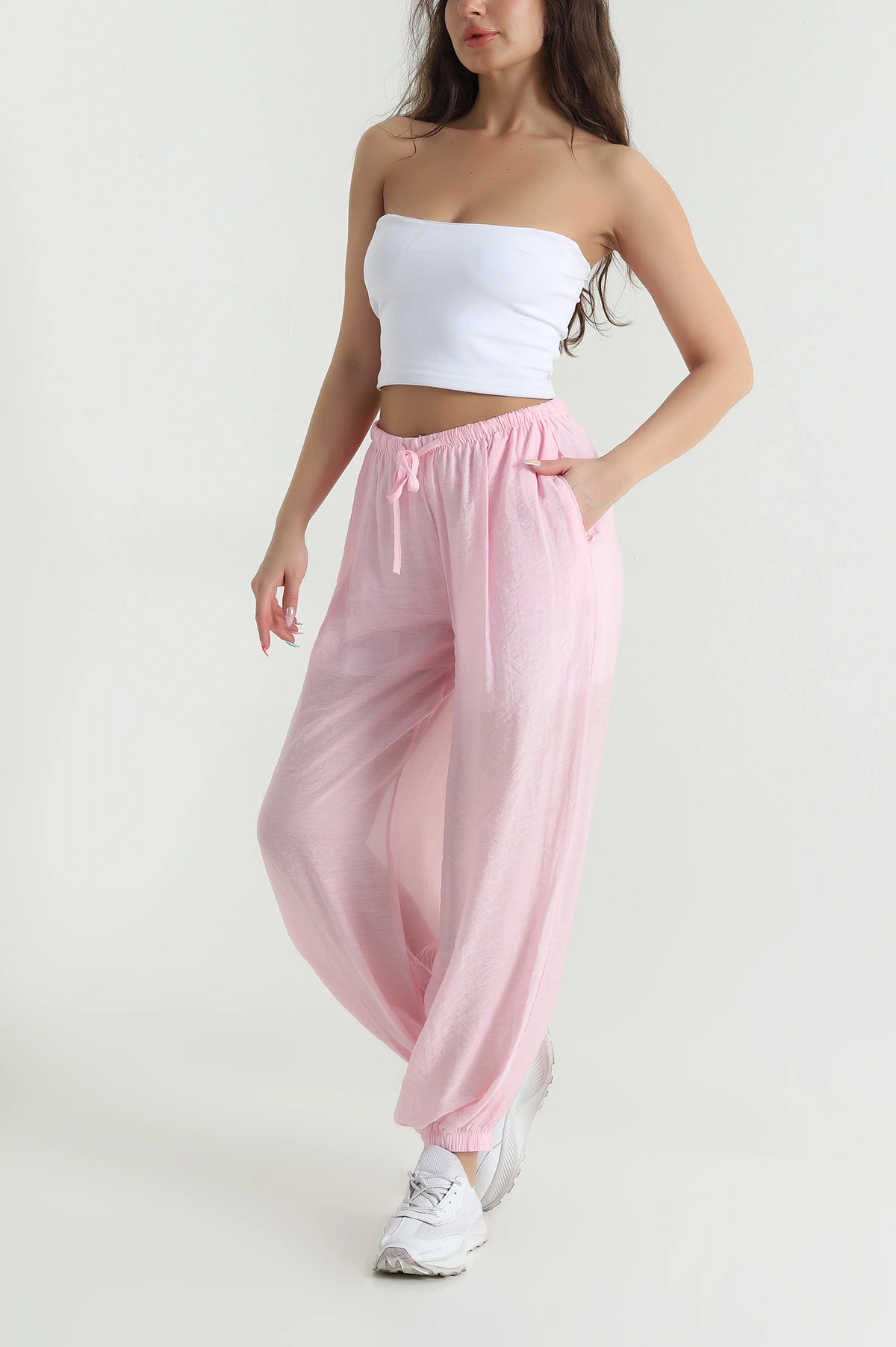Pembe Bel ve Paça Lastikli Astarlı Tensel Kadın Pantolon 465314