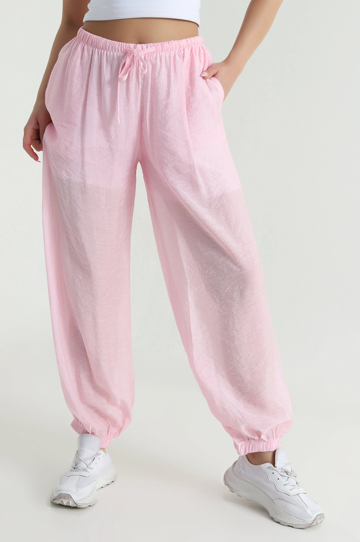 Pembe Bel ve Paça Lastikli Astarlı Tensel Kadın Pantolon 465314