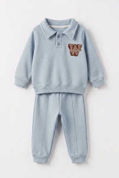 bebe-mavisi-6-24-ay-suzene-w-nakisli-yakasi-yarim-dugmeli-3-ip-sardonlu-erkek-bebek-kislik-takim-497424