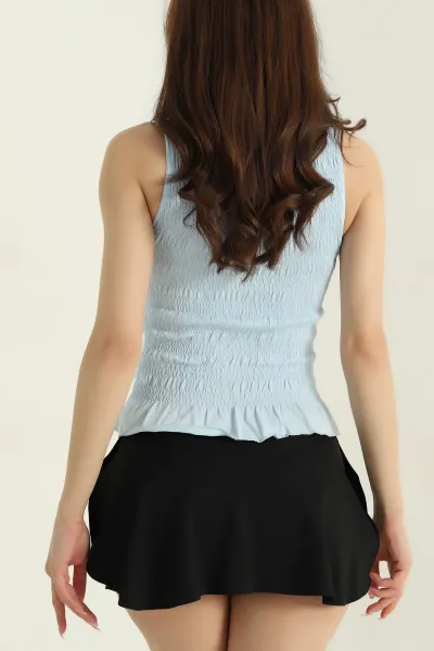 Bebe Mavisi Büzgülü Likralı Kadın Bluz 373646
