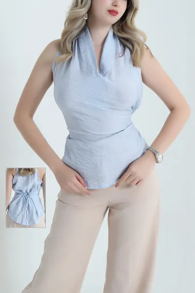 bebe-mavisi-kolsuz-baglamali-tensel-aerobin-kadin-bluz-466735