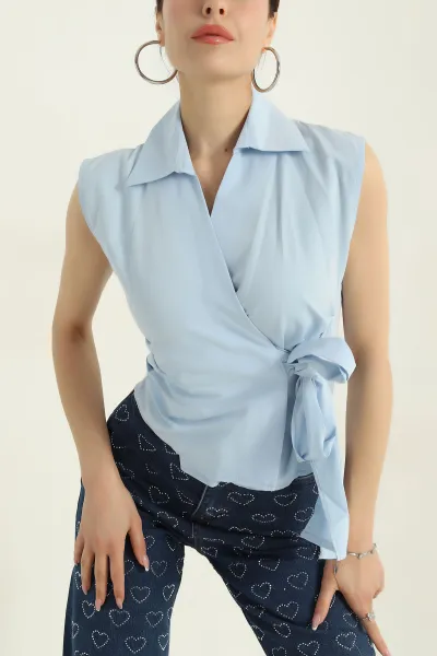 bebe-mavisi-kolsuz-poplin-kadin-gomlek-372055