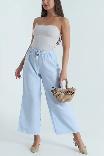 bebe-mavisi-nakisli-bol-paca-tasarim-kadin-pantolon-475273