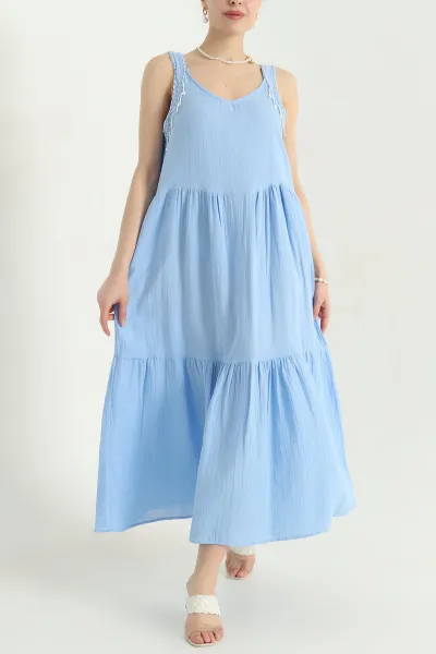 bebe-mavisi-tas-islemeli-muslin-kadin-elbise-345857