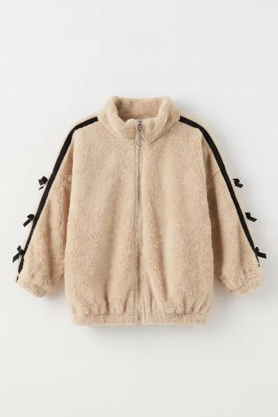 Bej (5-11 Yaş) Kolları Biyeli Fiyonk Detaylı Peluş Kız Çocuk Hırka 497872
