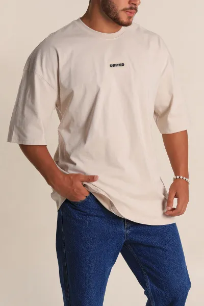 bej-oversize-suprem-kumas-plastik-baski-detayli-erkek-tisort-267357