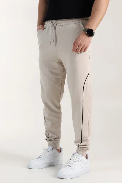 bej-regular-fit-serit-detayli-paca-lastikli-erkek-esofman-alti-402373