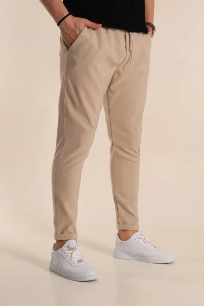 bej-relaxed-fit-bel-baglamali-duble-paca-erkek-jogger-pantolon-257468