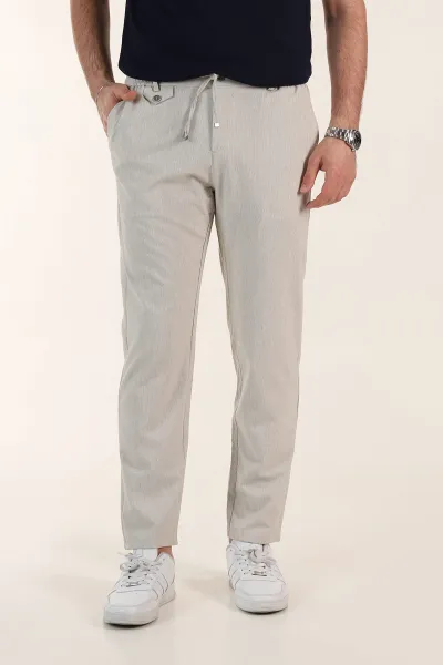 bej-relaxed-fit-gofre-kumas-bel-arkasi-lastikli-erkek-pantolon-362583