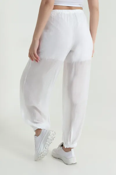 Beyaz Bel ve Paça Lastikli Astarlı Tensel Kadın Pantolon 465315
