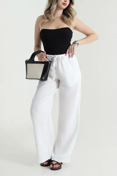 beyaz-bol-paca-cepli-muslin-kadin-pantolon-475331