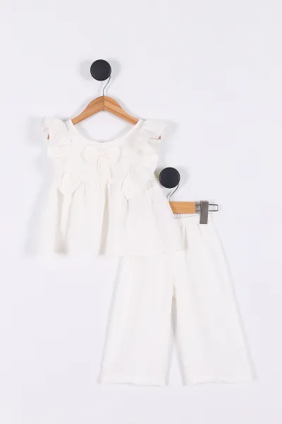 ekru-2-5-yas-gofre-kumas-kol-firfirli-pantolonlu-kiz-cocuk-takim-274953