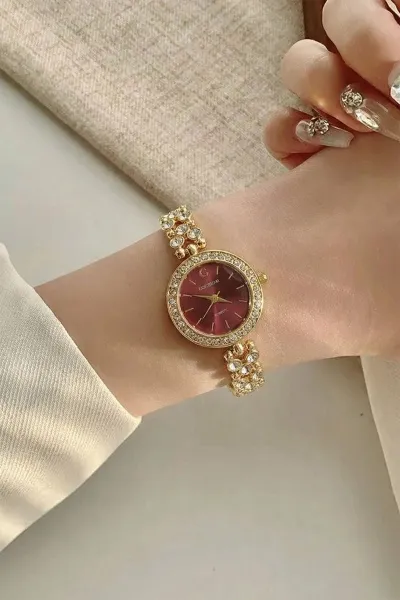 gold-mor-tasli-zarif-kadin-saat-434544