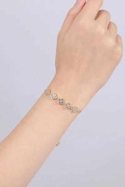 gold-yonca-figurlu-zirkon-tasli-sikistirmali-bileklik-474809