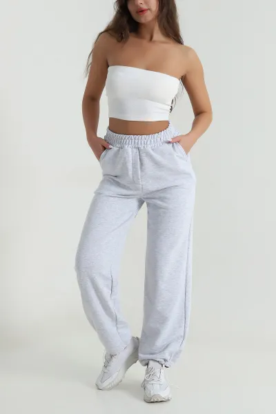 gri-bel-ve-paca-lastikli-uc-ip-kadin-pantolon-484565
