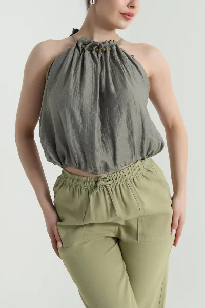 haki-yaka-boncuk-detay-muslin-bluz-470624