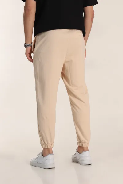 Krem Relaxed Fit İki İp Paça Lastikli Eşofman Altı 347595