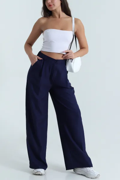 lacivert-pileli-cep-detay-bol-paca-keten-kadin-pantolon-479576