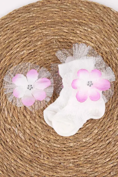 lila-0-6-aycicek-uzeri-tasli-tullu-kiz-bebek-corap-467387