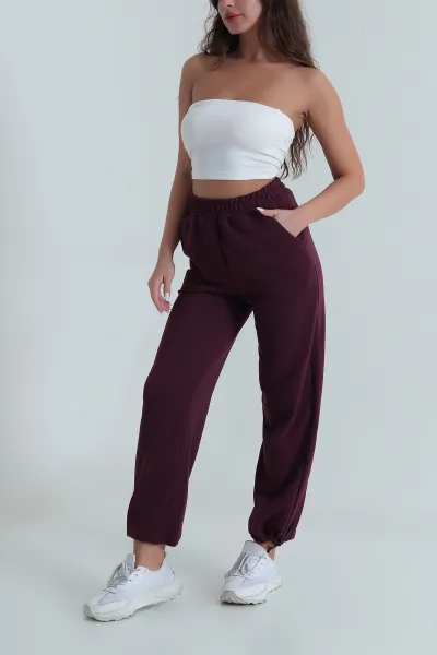 mor-bel-ve-paca-lastikli-uc-ip-kadin-pantolon-484564