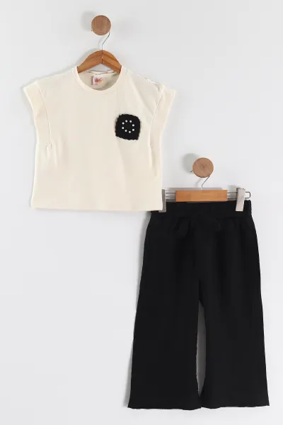 siyah-6-10-yas-gogusten-orgu-nakisli-tisort-ve-muslin-pantolonlu-kiz-cocuk-2li-takim-458991