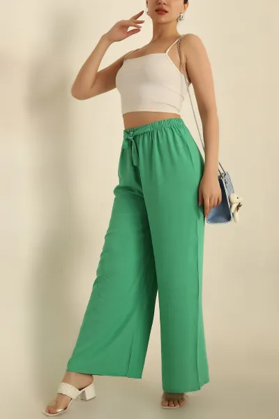 yesil-baglamali-beli-lastikli-dokuma-pantolon-269137